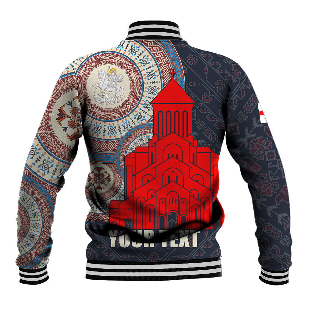 Unisex dark baseball jacket with ribbed collar, large red cathedral graphic and circular emblem