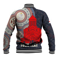 Unisex dark baseball jacket with ribbed collar, large red cathedral graphic and circular emblem