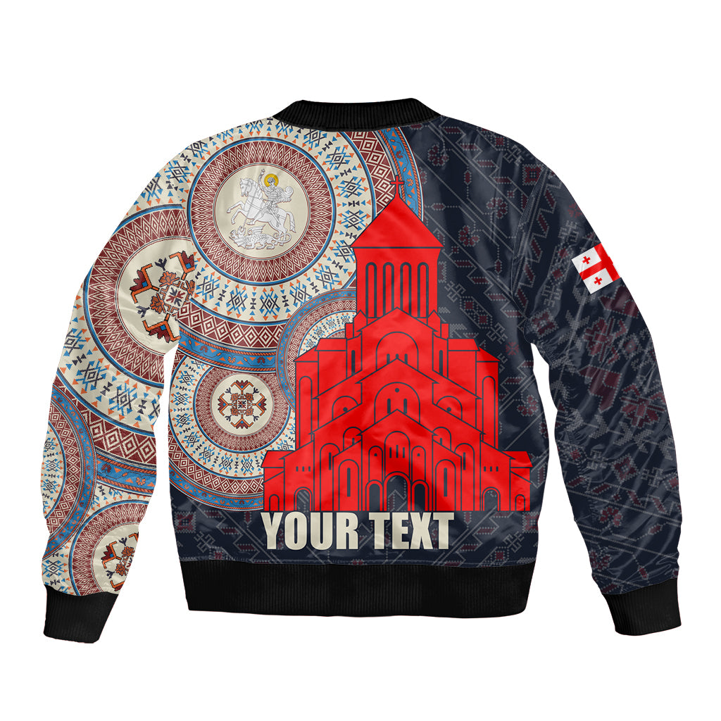 Unisex dark bomber jacket with red cathedral graphic, blue pattern sleeves, ribbed hem