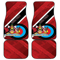 Set of four red car floor mats with diagonal stripe pattern and crest emblem