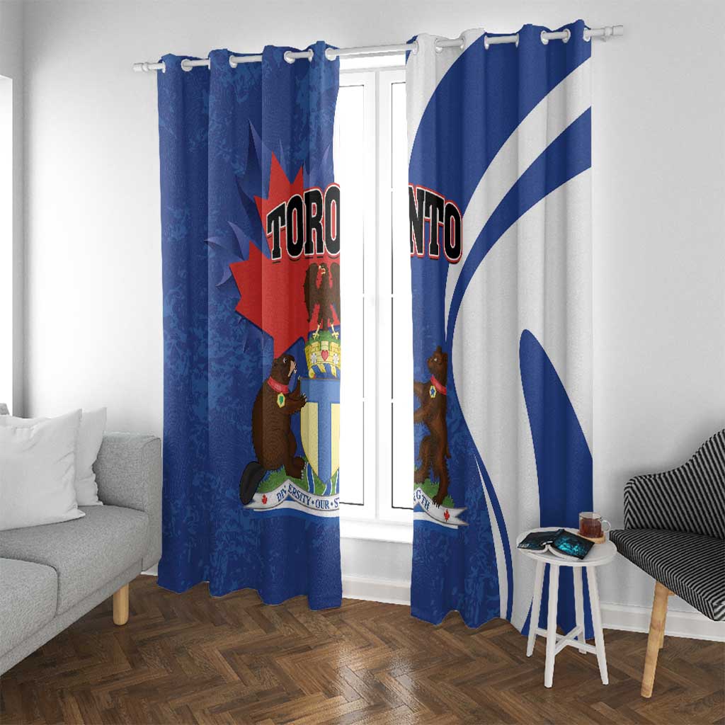 Blue Toronto curtains with ring-style top and shield artwork, two panels