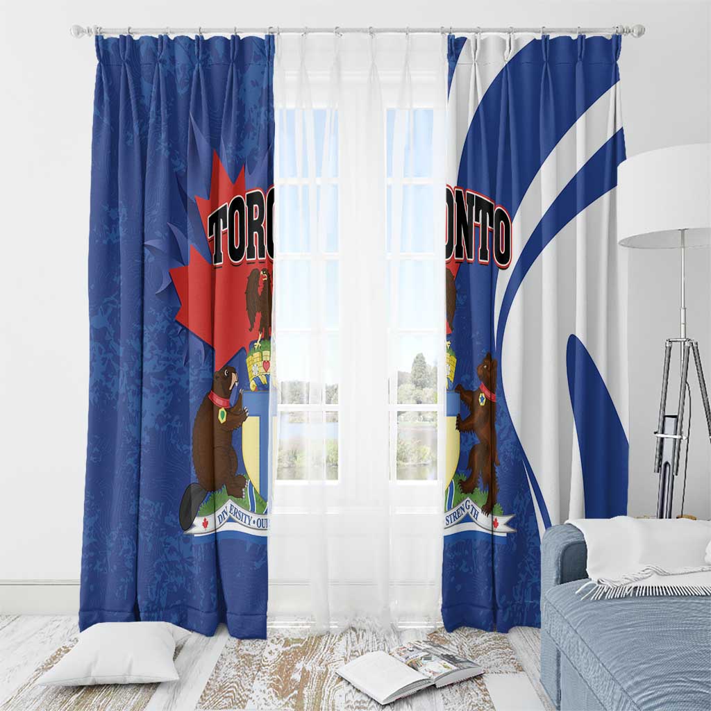 Blue Toronto curtain panels with gathered top and shield graphics, bedroom setting