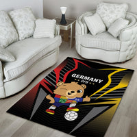 Black football area rug with Germany DFB bear mascot, soccer ball, red/yellow rays