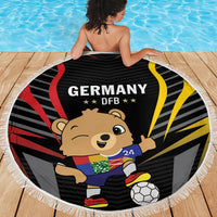 Round beach blanket with black Germany DFB bear design and white fringe border
