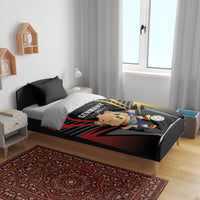 Football bedding set on bed with black duvet, Germany DFB bear print, and two pillowcases