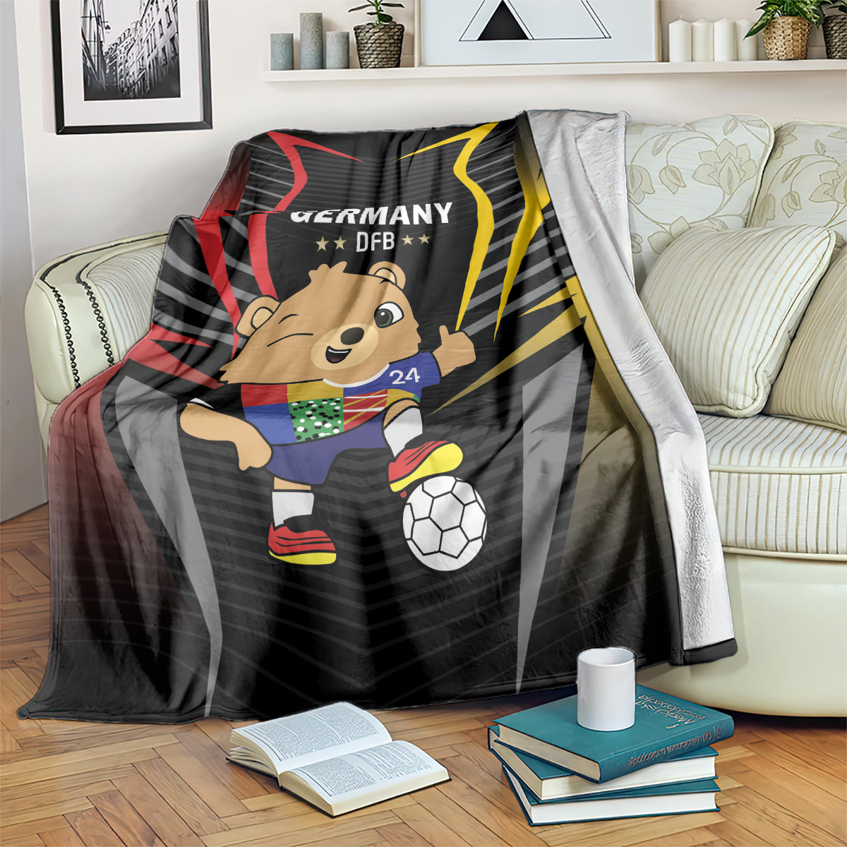 Black blanket draped on sofa, Germany DFB logo with cartoon mascot and soccer ball