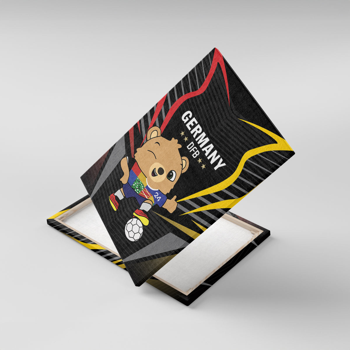 Black canvas print on wooden base, tilted view of Germany bear with soccer ball