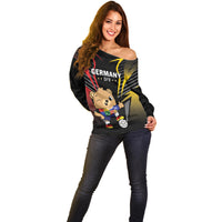 Women’s black off-shoulder football sweater with Germany DFB mascot front print