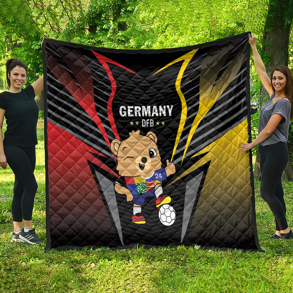 Black Germany 2024 quilt with DFB logo, bear mascot, soccer ball, and red/yellow rays