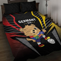 Black Germany-themed quilt with DFB text, cartoon bear in blue kit, soccer ball