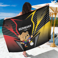 Black Germany DFB football sarong with mascot and bold yellow and red graphic