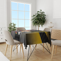 Black football tablecloth with Germany 2024 design and soccer ball graphic over dining table