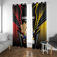 Two black football curtain panels with mascot, Germany/DFB lettering, and red/yellow lightning rays
