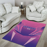 Pink and purple Germany DFB area rug on hardwood, “GERMANY DFB” logo with star details
