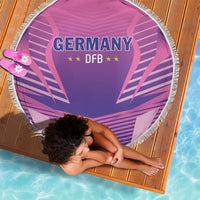 Round pink beach blanket with fringed edge, Germany DFB crest on purple heart graphic