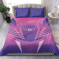 Pink and purple duvet cover with Germany DFB emblem and two solid blue pillow shams