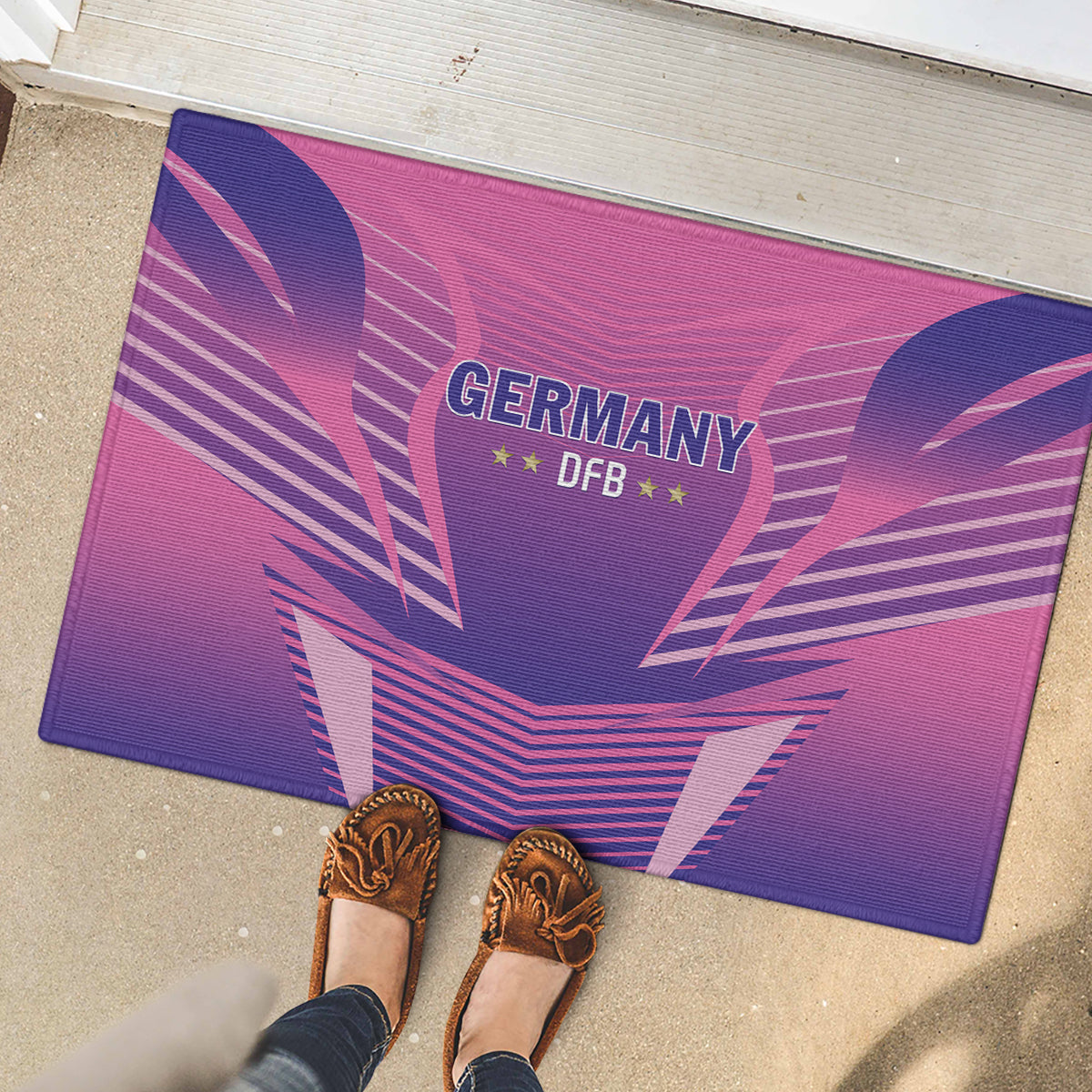 Pink and purple rubber doormat with Germany DFB badge and heart-and-stripe pattern