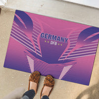 Pink and purple rubber doormat with Germany DFB badge and heart-and-stripe pattern