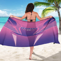 Pink-and-purple football sarong draped with centered Germany DFB emblem and striped graphics