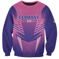 Pink football sweatshirt with navy sleeves, front print 'GERMANY' and 'DFB' badge
