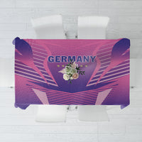 Football tablecloth folded display with Germany crest graphic and purple geometric design