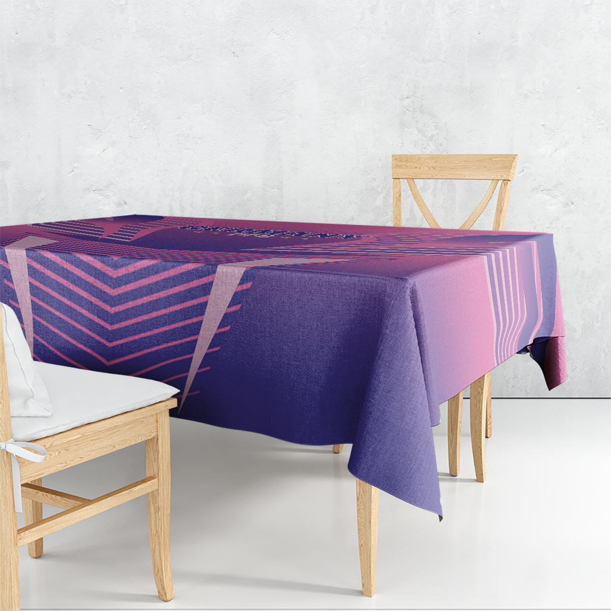 Purple and pink football tablecloth draped over a bench and dining chairs