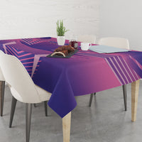 Pink and purple football tablecloth with geometric stripes, draped on a dining table