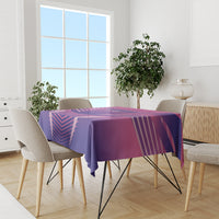 Football tablecloth in purple and pink geometric pattern, covering a rectangular dining table