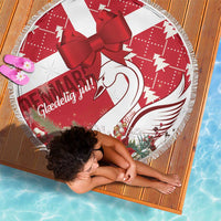 Round beach blanket, red and white, with bow centerpiece and fringed edge