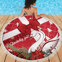 Round red and white beach blanket with large satin bow and fringed border