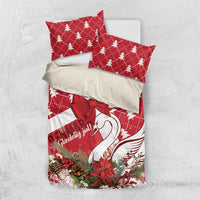 Red Christmas duvet cover set with bow, swan graphic, and tree icon accents