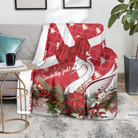 Red and white Christmas throw blanket with bow and swan motif and festive floral border