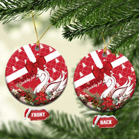 Red ceramic Christmas ornament with coquette bow and swan motif, round shape