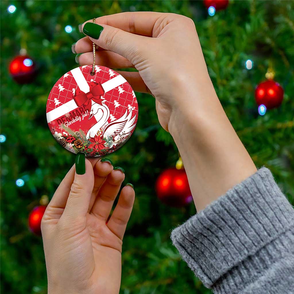 Red round ceramic Christmas ornament with coquette bow and swan motif