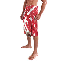Red swan lavalava skirt with ribbon bow detail and Christmas tree pattern