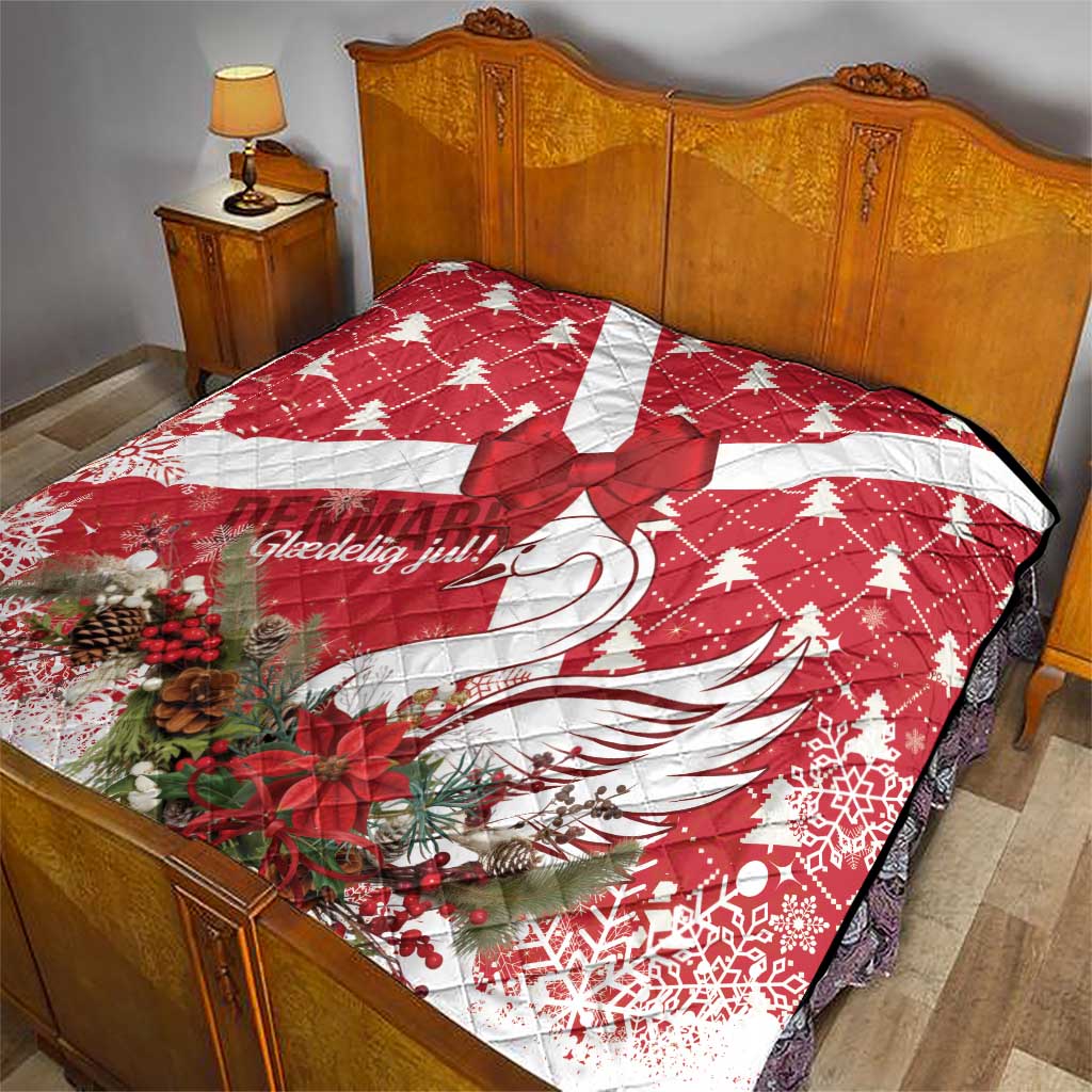Red holiday quilt on a bed with white stripe panels, star motif, swan feathers, florals
