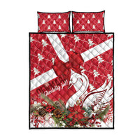 Red Christmas quilt cover with swan-and-bow design and two matching pillowcases, flat lay