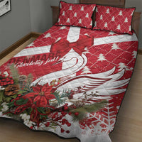 Red and white Christmas quilt bed set with swan motif and bow accents, with 2 pillowcases