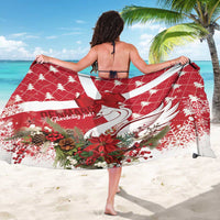 Red holiday sarong with swan motif and bow tie, worn as backless cover.