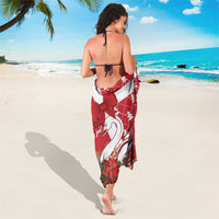 Red and white swan-print sarong with waist bow, tied at back.