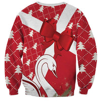Red and gray Christmas sweatshirt with bow and swan face graphic, crew neck