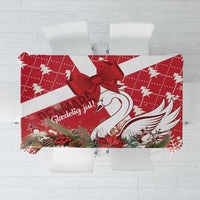 Red Christmas tablecloth with large bow and swan holiday print