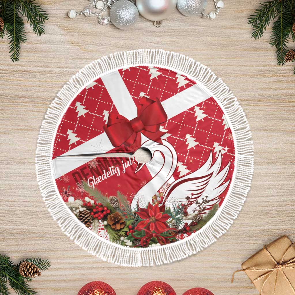 Red and white round tree skirt with red bow and fringed border, holiday swan print