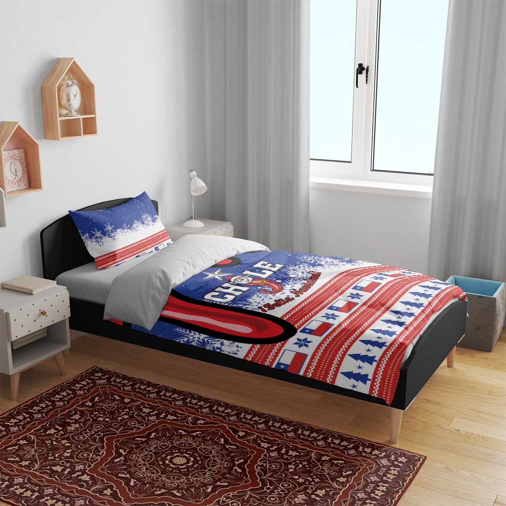 Blue Chile Christmas bedding set on bed: duvet and two pillows with snowflake stripe design.