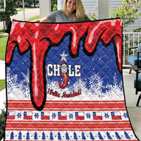 Christmas quilt with Chile-themed red, blue, and white graphic design and border trim
