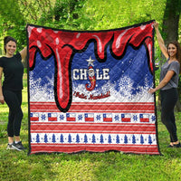 Chile Christmas quilt with red and blue swirls, snowflakes, and striped decorative border