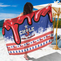 Chile Christmas sarong, blue with red swirls, snowflakes and “CHILE” print
