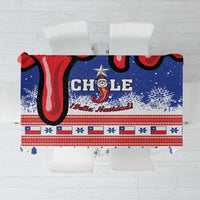 Blue Christmas tablecloth with Chile text, Santa Claus, snowflakes, and star accents