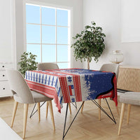 Blue Christmas tablecloth draped on dining table with Chile-themed border