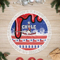 Blue round tree skirt with Chile crest and Feliz Navidad center, white fringe border